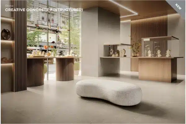 Image of big living room where sofa is lying on a floor made of Creative Concrete tiles by Ashlee.