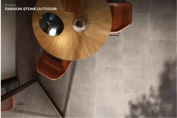 Image of floor and coffe table, focusing on Fashion Stone Tile floor by Ashlee