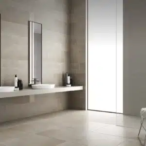 A closeup image of a modern minimalistic room with shelve and big mirror, image highlights Surface Floor & Wall Tiles